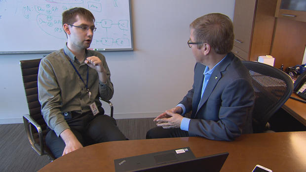 Mike Seborowski, who works in cyber security, and Jose Velasco, who heads SAP"s program for hiring autistic workers. Image courtesy of CBS News